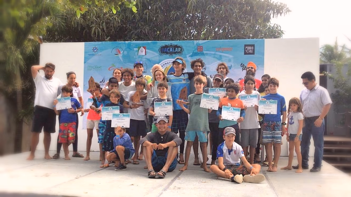 Young sailors with their certificates at a championship prize-giving in Bacalar